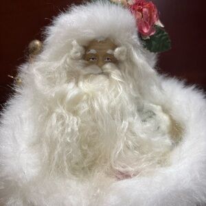 Santa Figurine with Fur Trim and Floral robe.